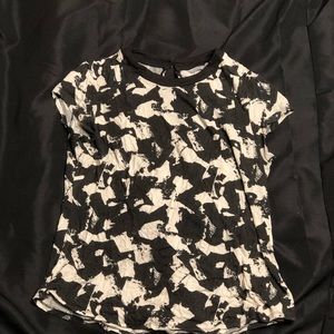 Back and white patterned blouse